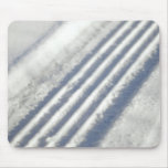 Close-up on a tyre traces in the snow mousepads