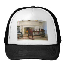 Cradle Near Fireplace Trucker Hat