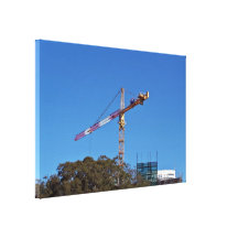 Crane in construction stretched canvas prints