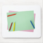 Crayons on coloured papers mousepads