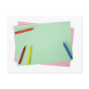 Crayons on coloured papers postcards