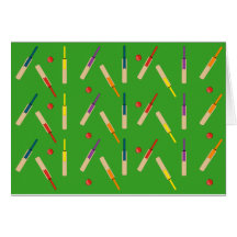 Cricket bats/ balls with green background Card