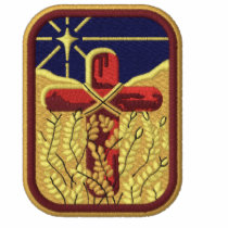 Cross In Field Of Wheat Polo