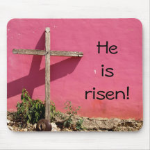 cross leaning on pink wall mousepad