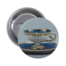 Cup and saucer with colourful designs buttons