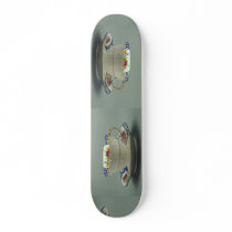 Cup and saucer with colourful flower designs on it skate board