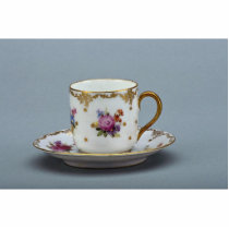 Cup and saucer with colourful flowers on it. photo cutout
