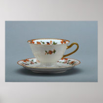 Cup and saucer with colourful flowers on it. poster