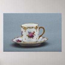 Cup and saucer with colourful flowers on it. print