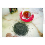 Cup of black tea with chocolate biscuits cards