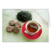 Cup of black tea with chocolate biscuits cards