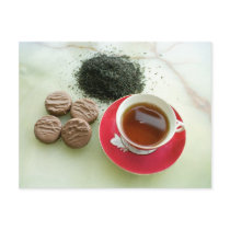 Cup of black tea with chocolate biscuits postcard