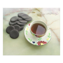 Cup of tea with chocolate art photo