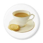 Cup of tea with cookie magnets