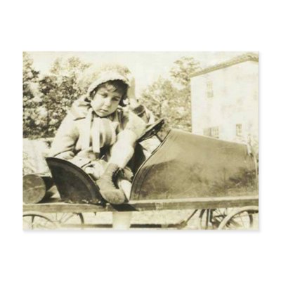 Cute girl in a peddle car postcard by amazingvintage