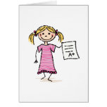 Cute little girl with A plus grade cards