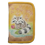 Cute racoon with red apple near pond planners