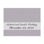 Cute tiny light grey lollypop gum on rough grey ba postcards
