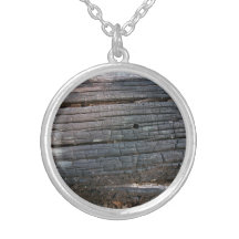 Detail of old wooden log with damaged surface pendant