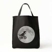 Dinosaur on a Bike In Sky With Moon Tote Bags