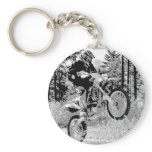 Dirt bike wheeling in the woods keychains
