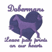 Dobermans Leave Paw Prints