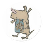 Dog holding his bones round stickers