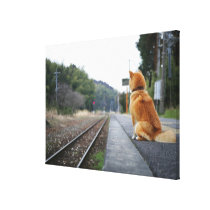 Dog sitting on train station canvas print