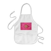 Doll amongst pink feathers Apron