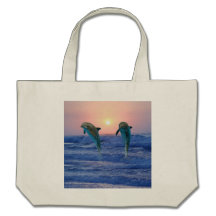 Dolphins at sunrise canvas bag