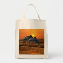 Dolphins at sunset canvas bag