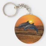 Dolphins at sunset key chains