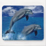 Dolphins  jumping for joy on a mouse pad