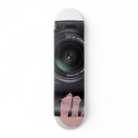 down the lens of a camera skateboards