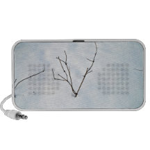 Dried branch on a snowy landscape PC speakers