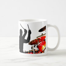 Drummer sticks in air shadow real drums mugs