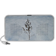 Dry branches tree sticking out of the snow iPod speakers