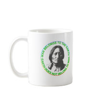 Earth does not belong to man coffee mug