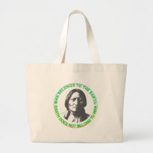 Earth does not belong to man tote bag