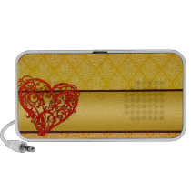 Enlightening red coloured heart speakers
