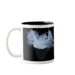 Entwined feathers are symbolic of mysticism mugs