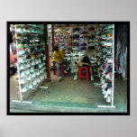 exhausted shoe salesmen in kuala lumpur, malaysia posters