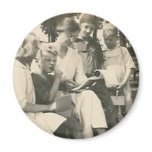 family reading boy shushing magnet