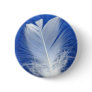 feather button