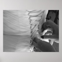 Female hand lacing up wedding dress back