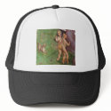 Ferret frolicking with angels hats