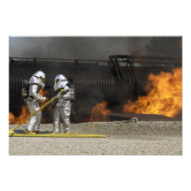 Firefighters neutralise a live fire photograph