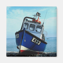 Fishing boat beached at pier fridge magnets