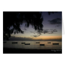 Fishing boats at sunset greeting card