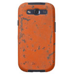 Flaky, scratched red paint. Faux rust and grunge casemate cases